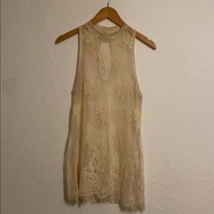 Beautiful lace keyhole back cream tunic